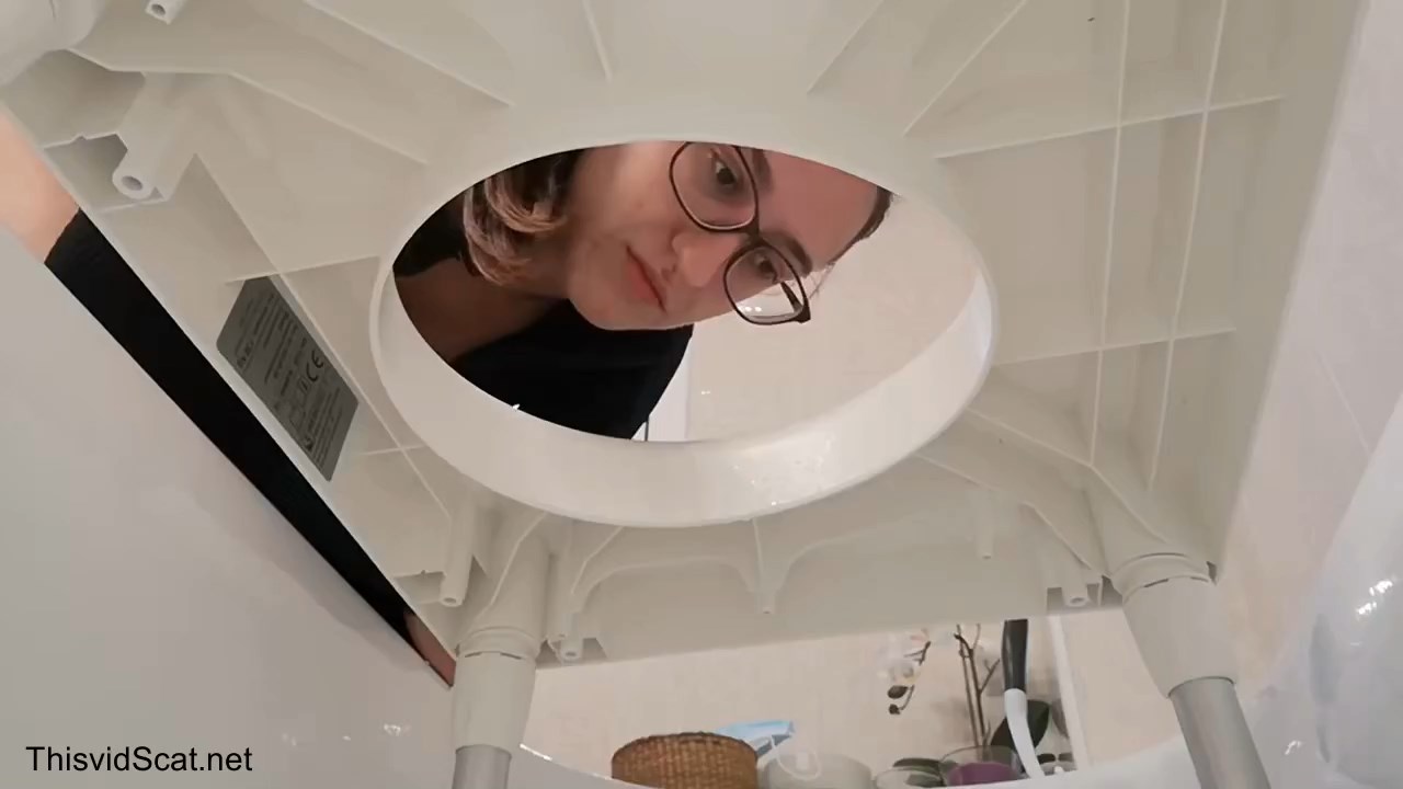 Shitting in the Bathtub Through Chair.